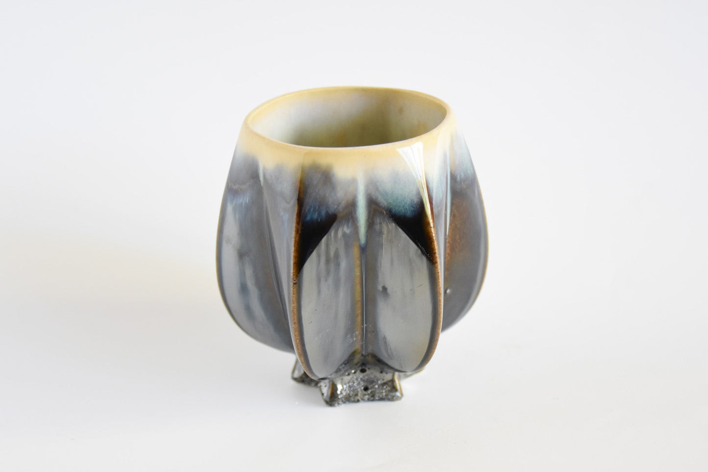 Handmade ceramic kiddush cup titled 'Stemmed Kiddush Cup - Rainbow' – modern Judaica by Feldi Studios