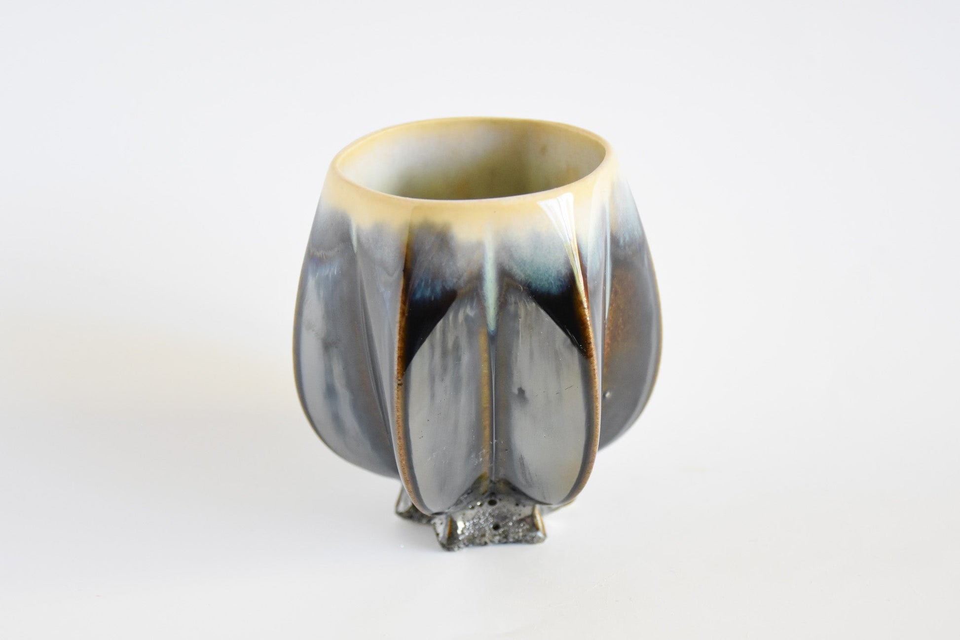 Handmade ceramic kiddush cup titled 'Stemmed Kiddush Cup - Rainbow' – modern Judaica by Feldi Studios