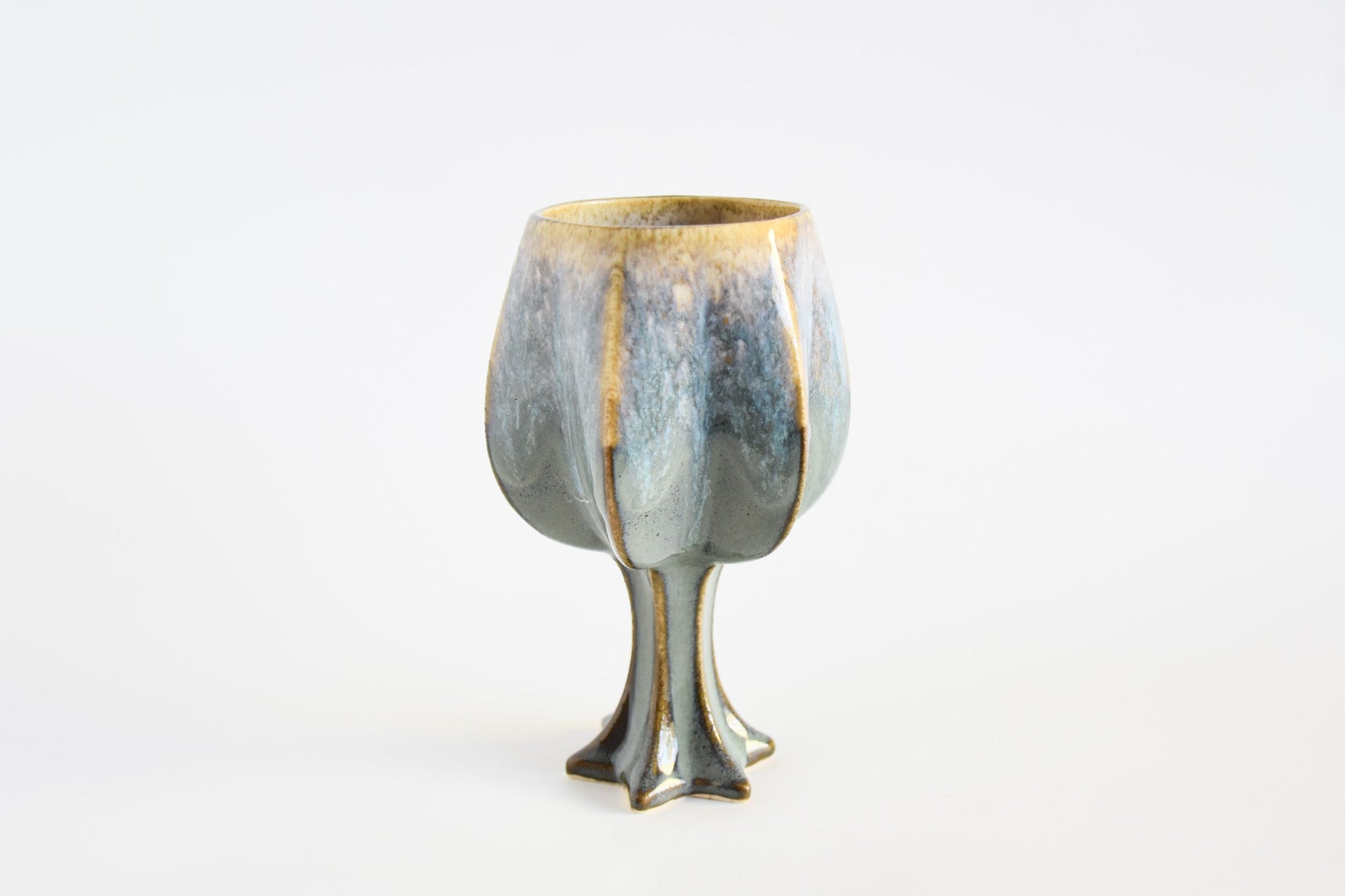Handmade ceramic kiddush cup titled 'Stemmed Kiddush Cup - Rainbow' – modern Judaica by Feldi Studios