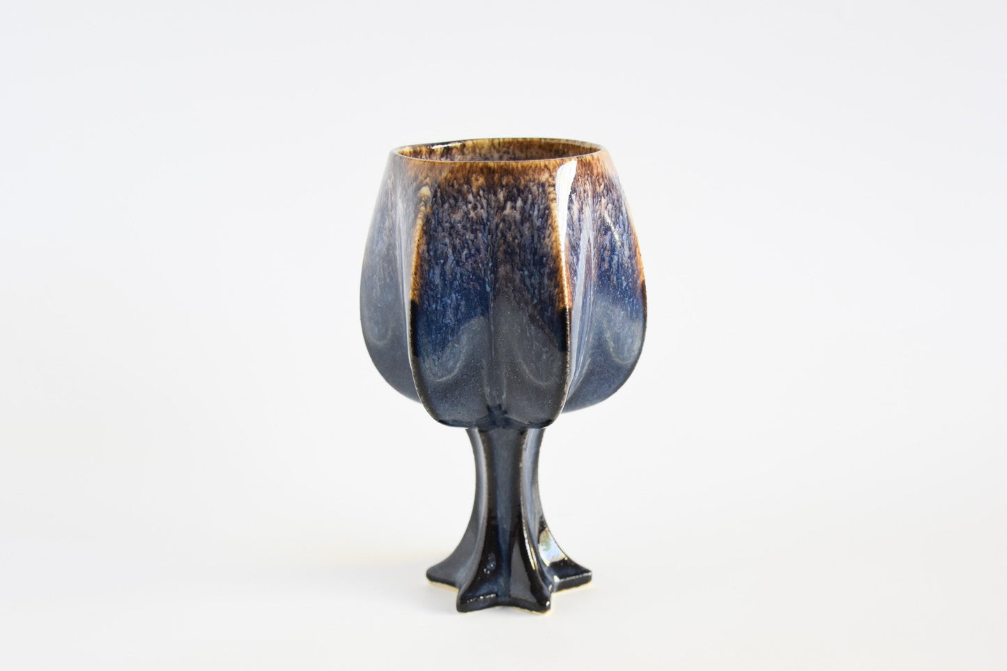Handmade ceramic kiddush cup titled 'Stemmed Kiddush Cup - Rainbow' – modern Judaica by Feldi Studios