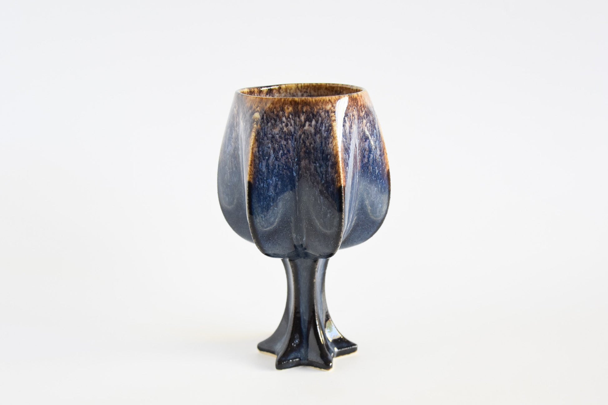 Handmade ceramic kiddush cup titled 'Stemmed Kiddush Cup - Rainbow' – modern Judaica by Feldi Studios