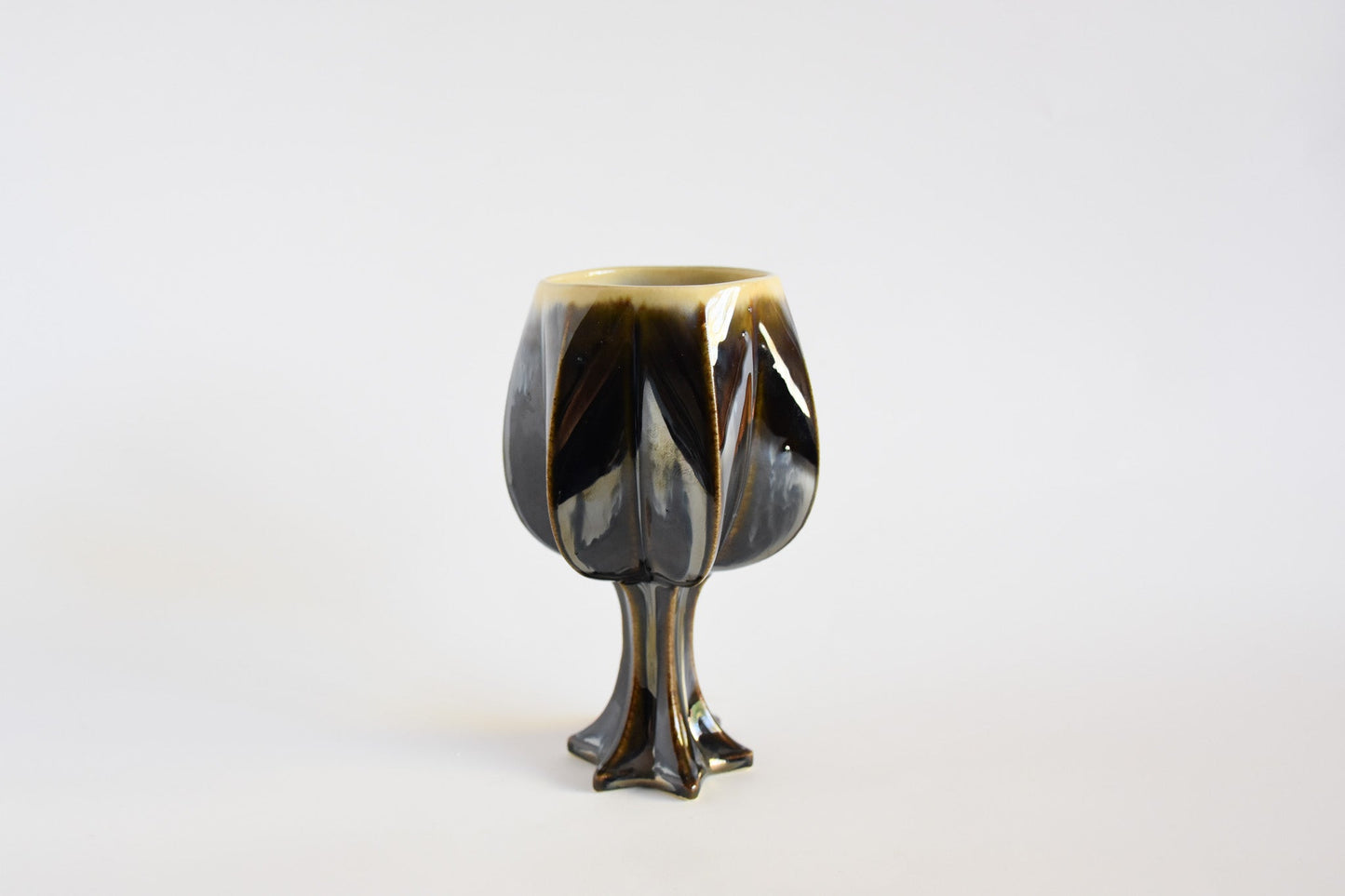 Handmade ceramic kiddush cup titled 'Stemmed Kiddush Cup - Rainbow' – modern Judaica by Feldi Studios