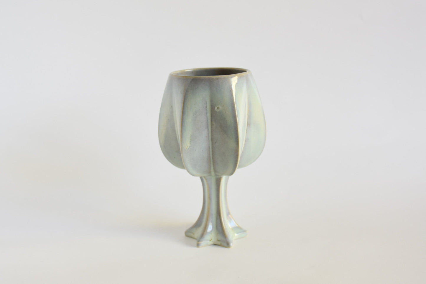 Handmade ceramic kiddush cup titled 'Stemmed Kiddush Cup - Rainbow' – modern Judaica by Feldi Studios