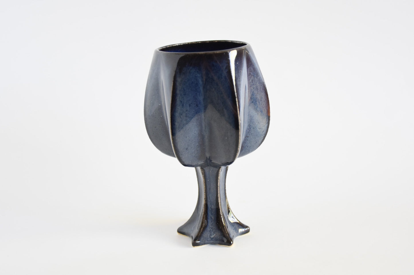 Handmade ceramic kiddush cup titled 'Stemmed Kiddush Cup - Rainbow' – modern Judaica by Feldi Studios