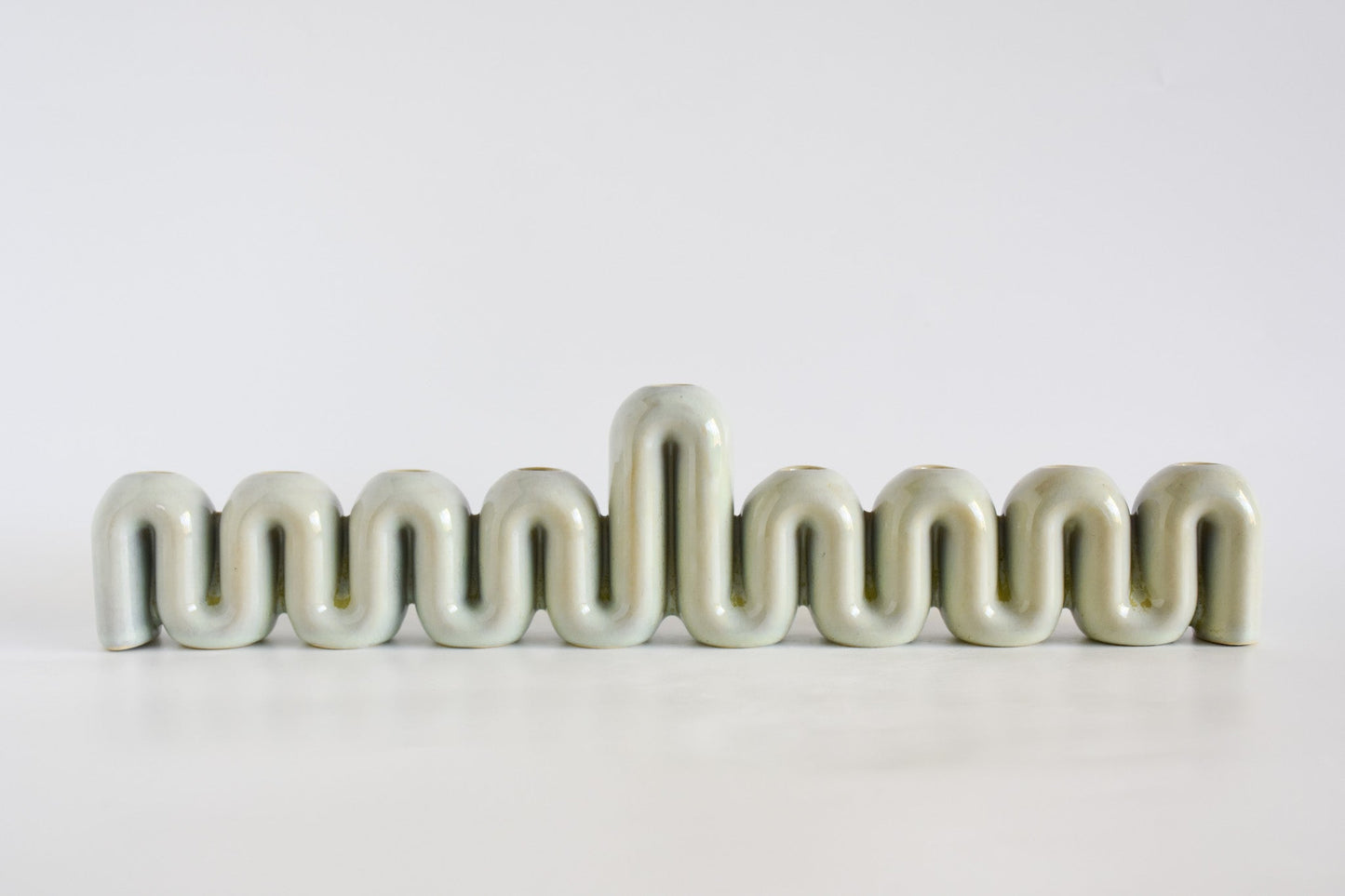 Handmade ceramic menorah titled 'Hanukkah Menorah - Cream | SECOND' – modern Judaica by Feldi Studios