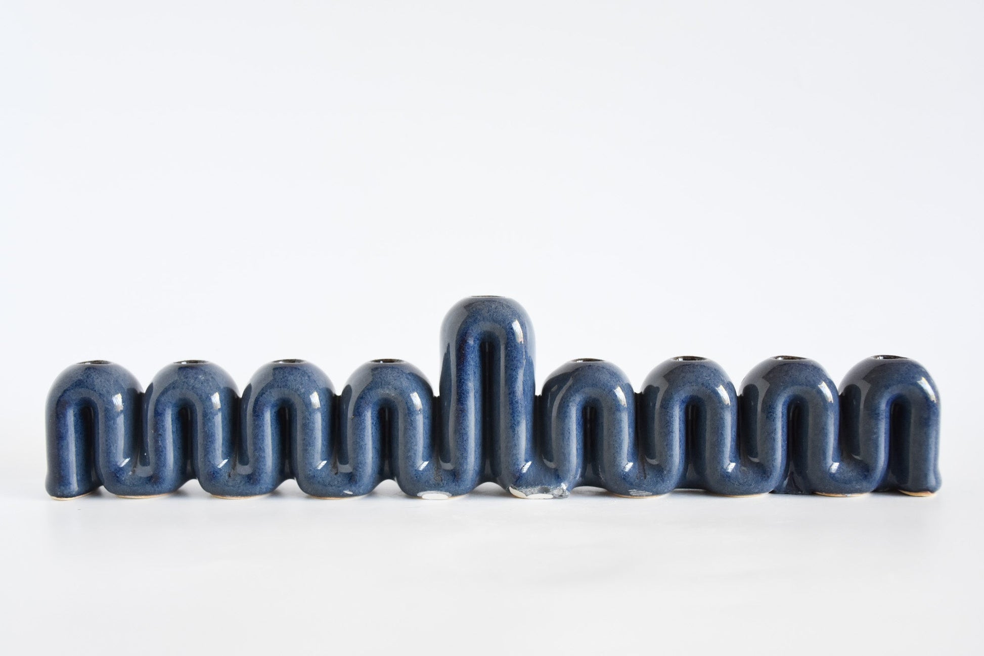 Handmade ceramic menorah titled 'Hanukkah Menorah - Cream | SECOND' – modern Judaica by Feldi Studios