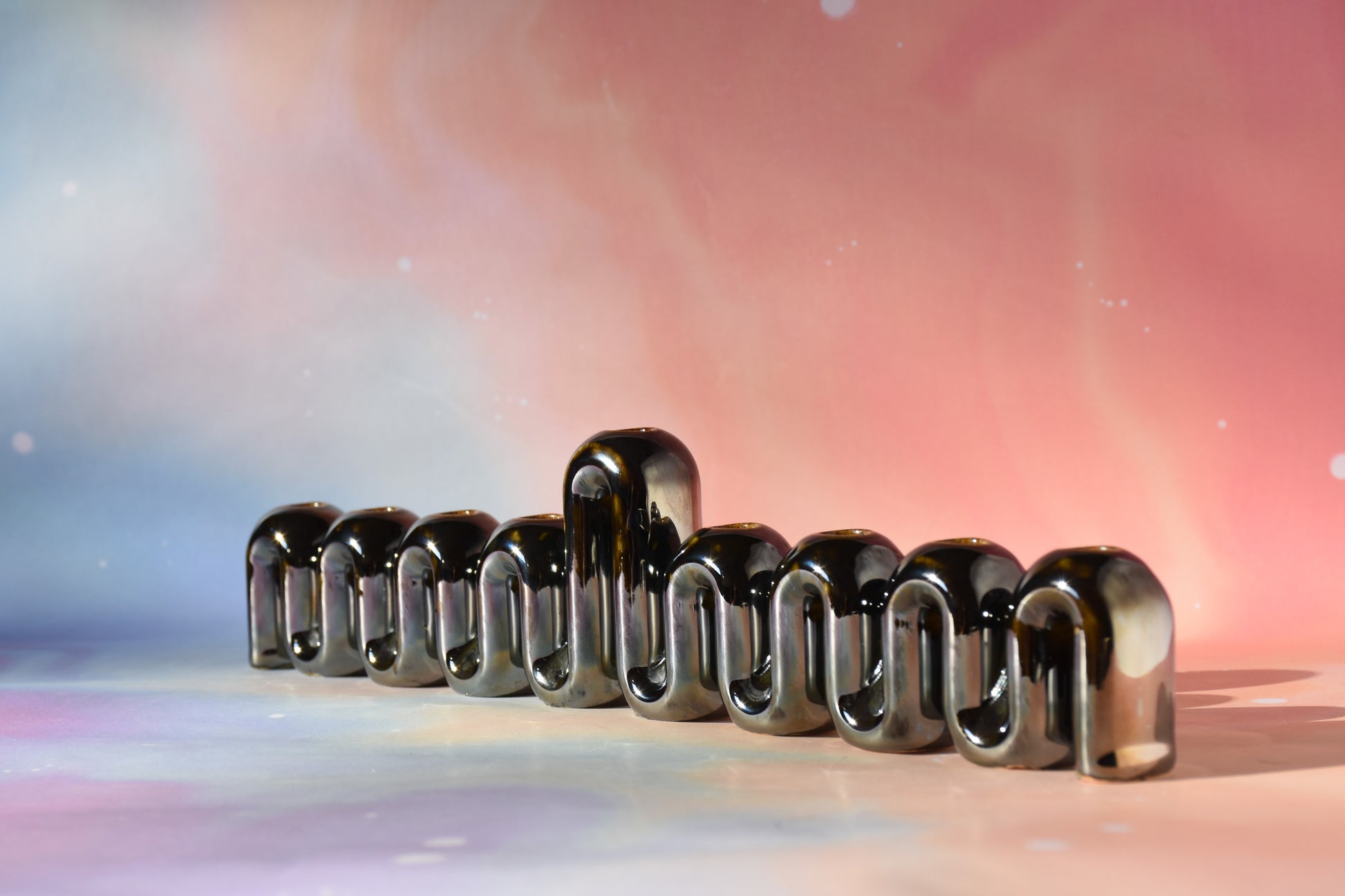 Handmade ceramic menorah titled 'Hanukkah Menorah - Chrome' – modern Judaica by Feldi Studios