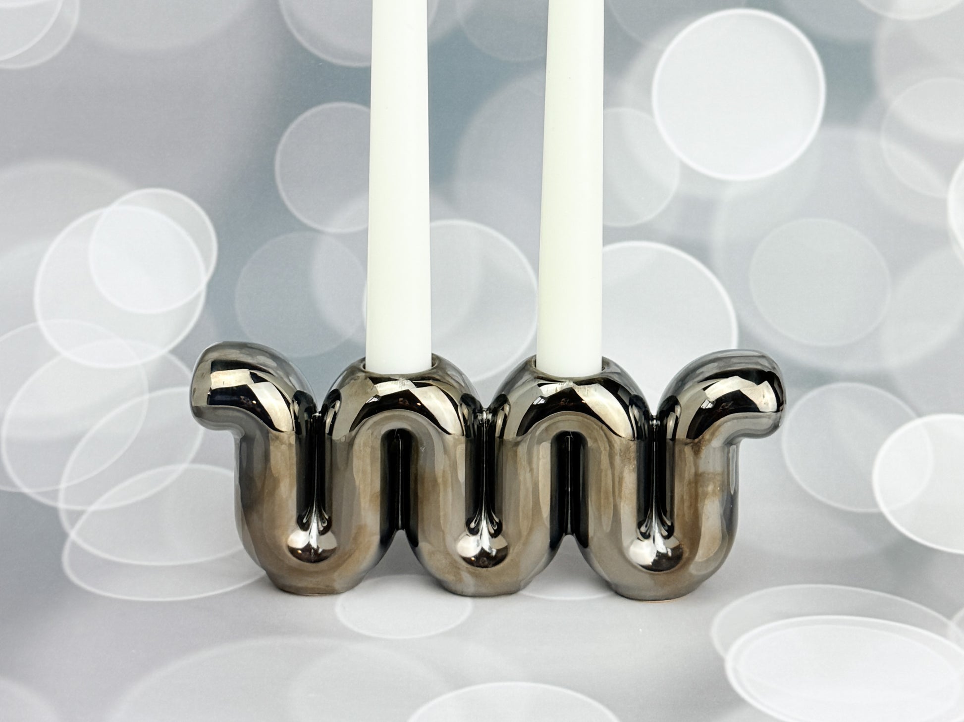 Handmade ceramic candle holders titled 'Candelabra - Chrome' – modern Judaica by Feldi Studios