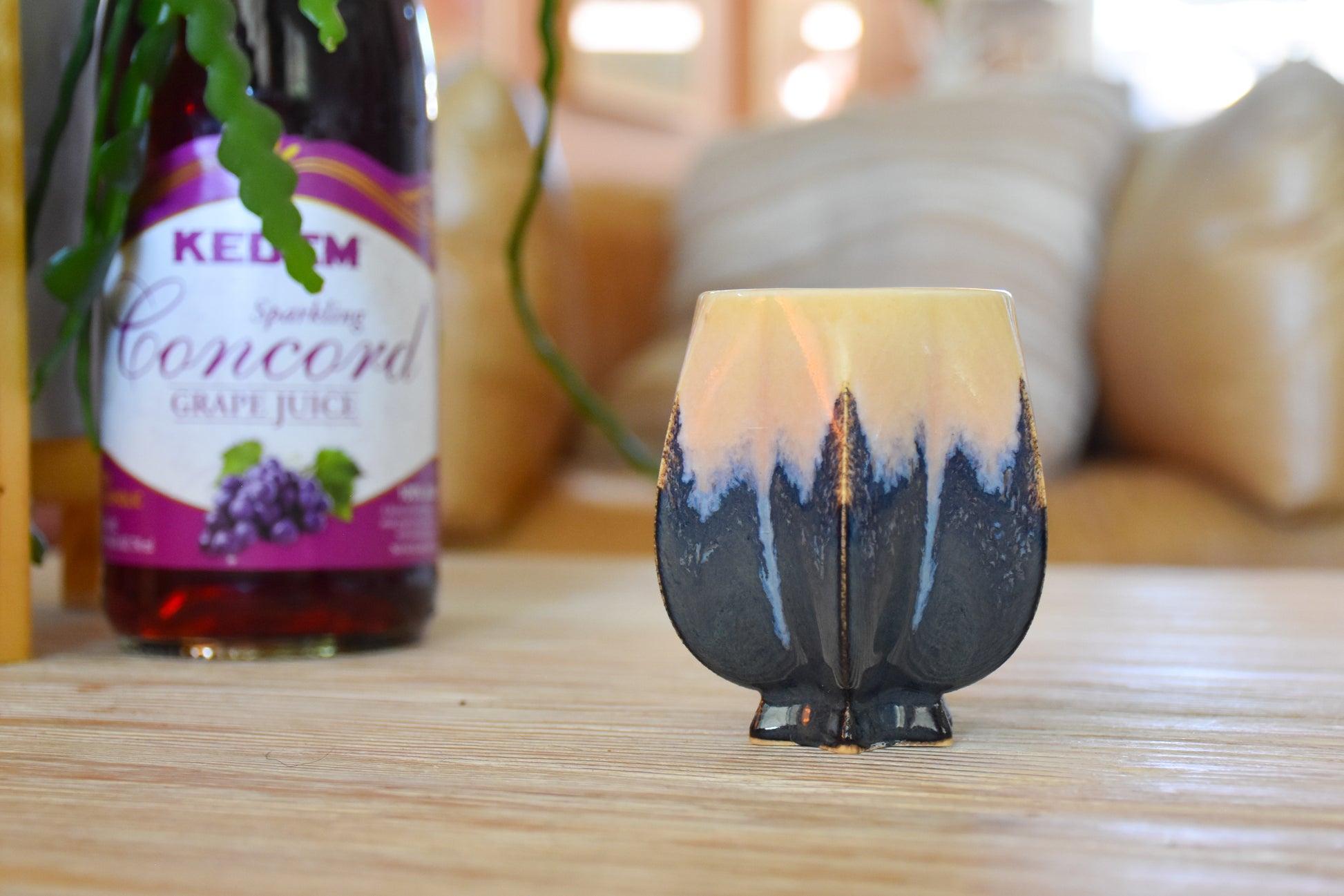 Handmade ceramic kiddush cup titled 'Pom Kiddush Cup - Blue + Gold' – modern Judaica by Feldi Studios