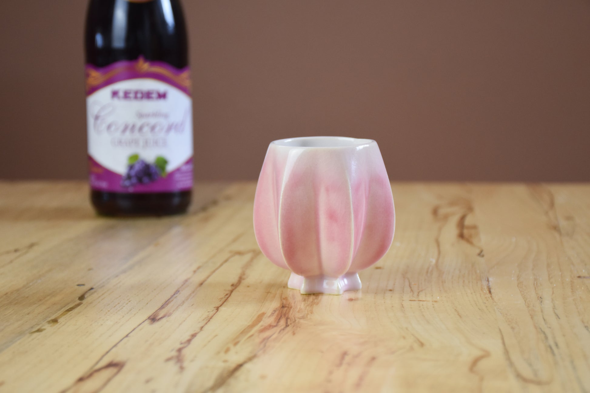 Handmade ceramic kiddush cup titled 'Pom Kiddush Cup - Blush' – modern Judaica by Feldi Studios