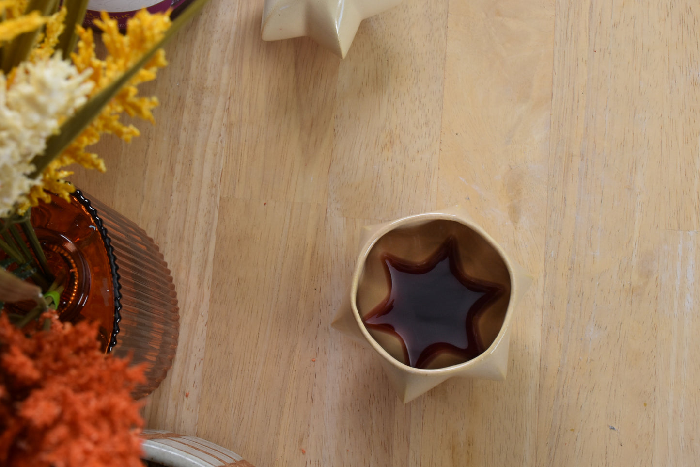 Handmade ceramic shabbat kiddush cup titled 'Pom Kiddush Cup - Almond' – modern Judaica by Feldi Studios