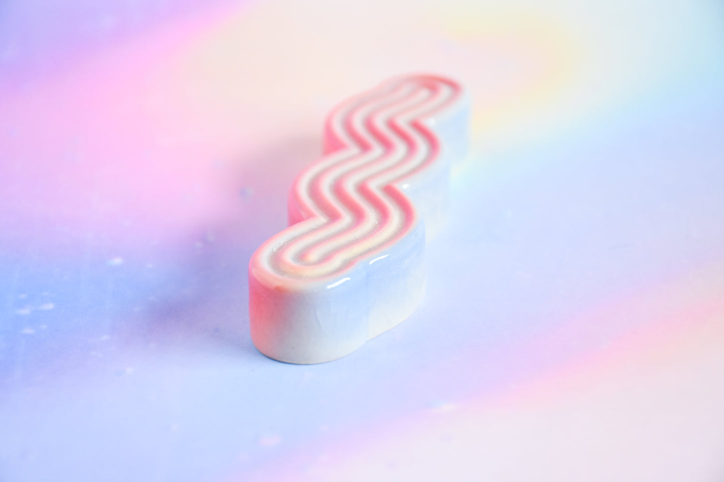 Handmade ceramic mezuzah titled 'Squizuzah Mezuzah - Cotton Candy Fade' – modern Judaica by Feldi Studios