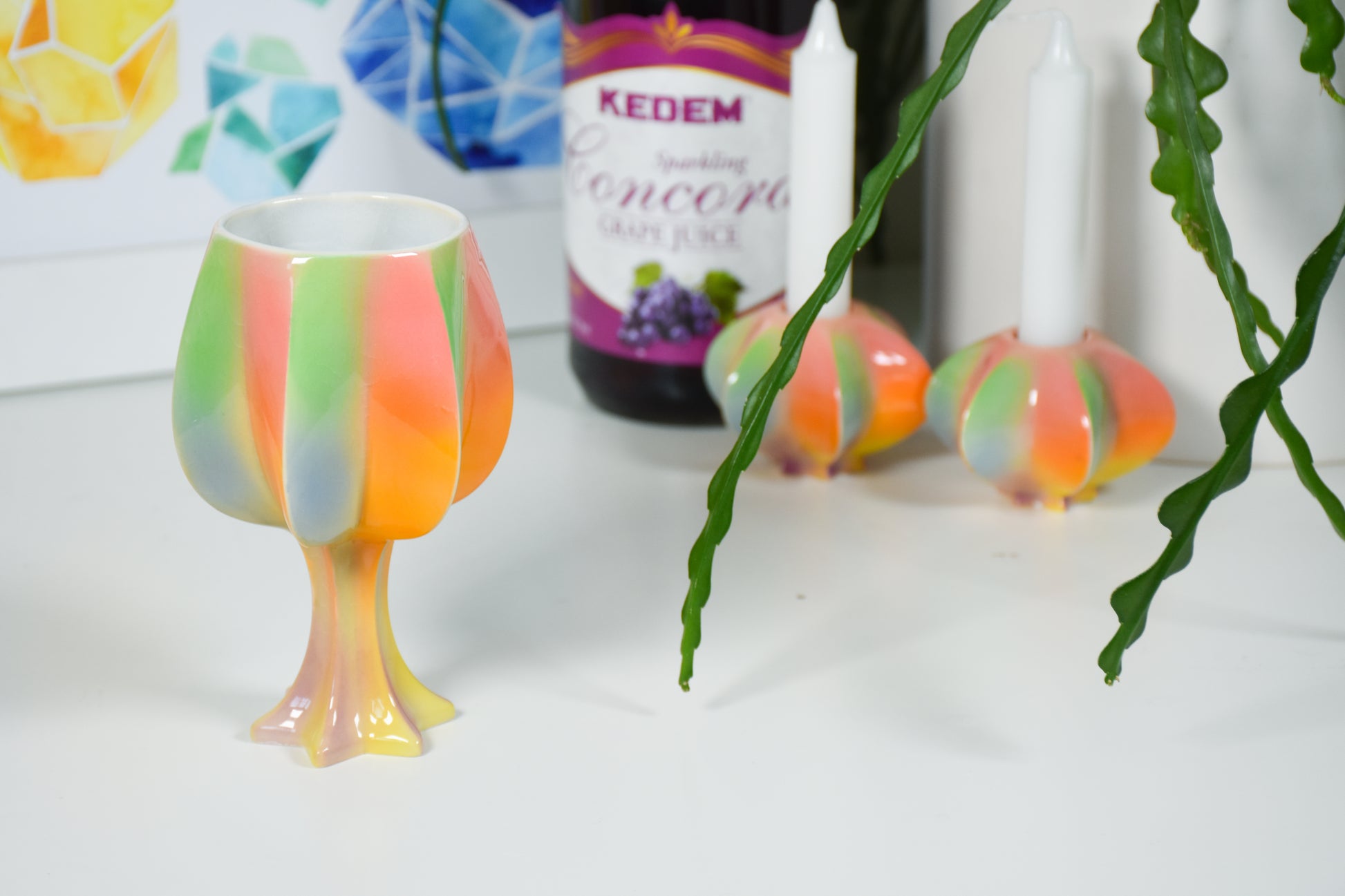Handmade ceramic kiddush cup titled 'Stemmed Kiddush Cup - Rainbow' – modern Judaica by Feldi Studios