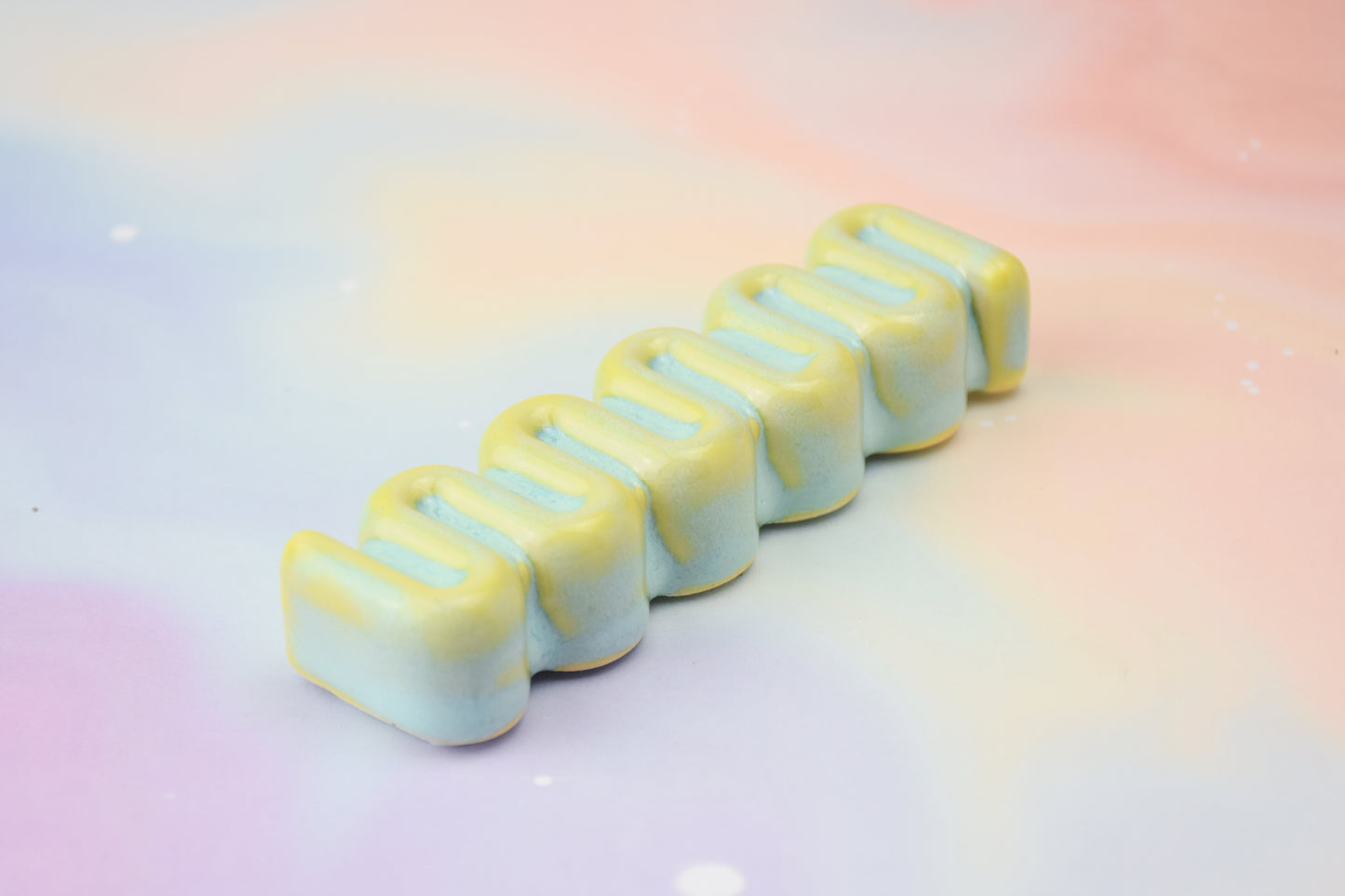 Handmade ceramic mezuzah titled 'Ribbon Mezuzah - Summer Sky' – modern Judaica by Feldi Studios