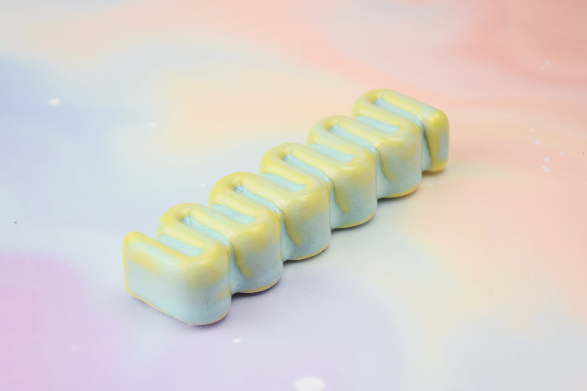 Handmade ceramic mezuzah titled 'Ribbon Mezuzah - Summer Sky' – modern Judaica by Feldi Studios