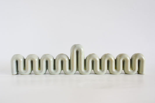 Handmade ceramic menorah titled 'Hanukkah Menorah - Cream | SECOND' â€“ modern Judaica by Feldi Studios