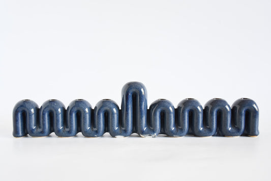 Handmade ceramic menorah titled 'Hanukkah Menorah - Cream | SECOND' â€“ modern Judaica by Feldi Studios