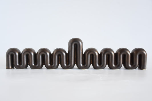 Handmade ceramic menorah titled 'Hanukkah Menorah - Cream | SECOND' â€“ modern Judaica by Feldi Studios