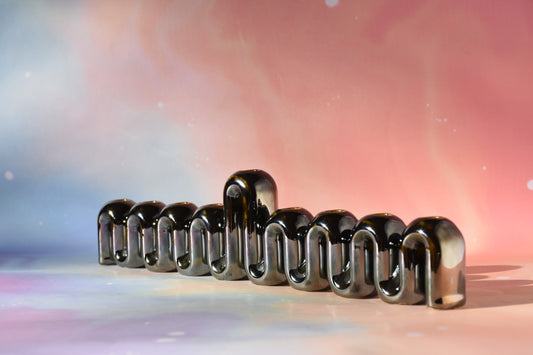 Handmade ceramic menorah titled 'Hanukkah Menorah - Chrome' – modern Judaica by Feldi Studios
