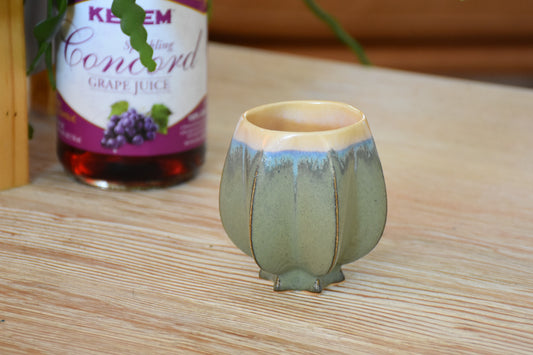 Handmade ceramic kiddush cup titled 'Pom Kiddush Cup - Gold and washed Denim' – modern Judaica by Feldi Studios