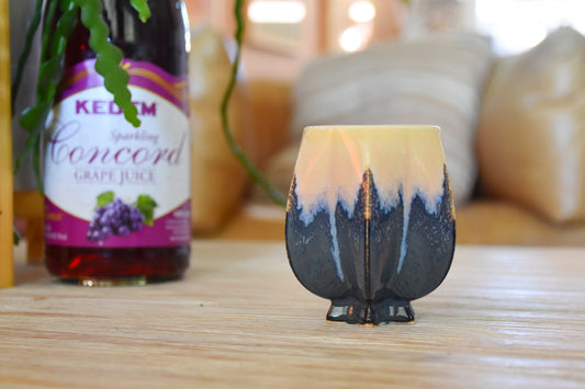 Handmade ceramic kiddush cup titled 'Pom Kiddush Cup - Blue + Gold' – modern Judaica by Feldi Studios
