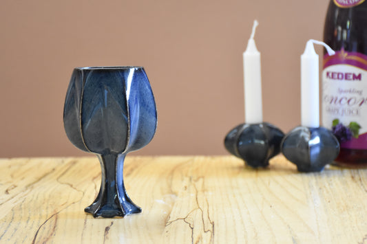 Handmade ceramic kiddush cup titled 'Stemmed Kiddush Cup - Dark Denim' – modern Judaica by Feldi Studios